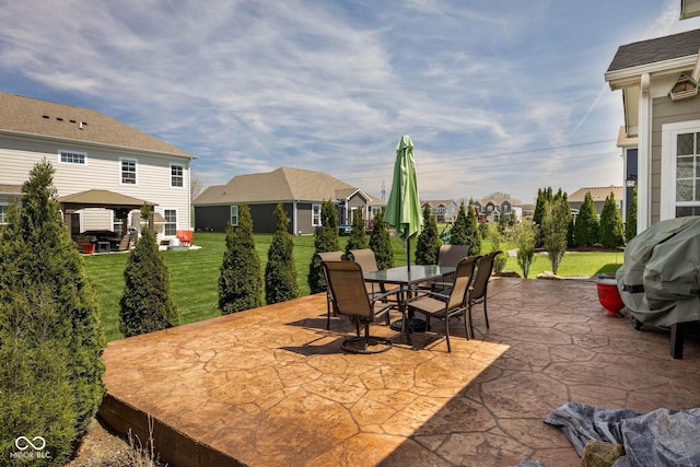 view of patio / terrace featuring outdoor dining area and a gazebo