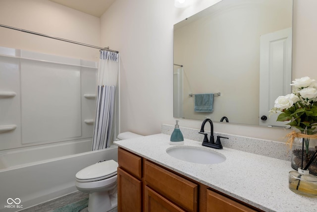 full bathroom with shower / bath combo, toilet, and vanity