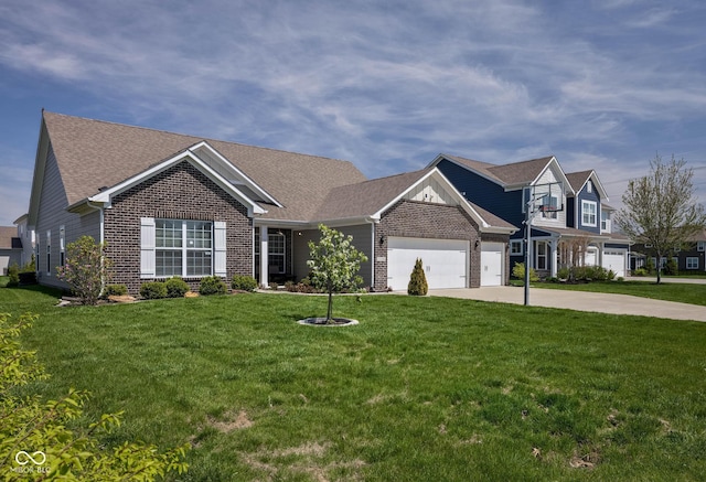 view of front of property with a front lawn, brick siding, driveway, and a garage