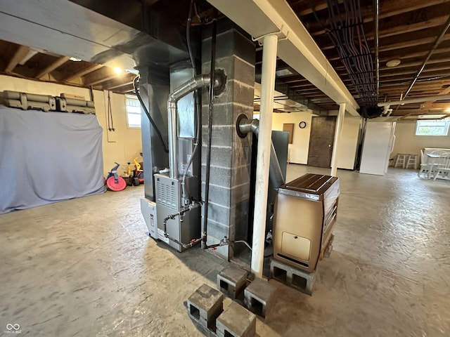 basement featuring heating unit