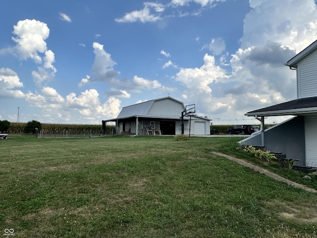 view of yard featuring a garage