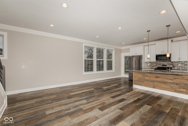 4077 Rookwood Ave, Indianapolis, IN 46208 - kitchen featuring baseboards, recessed lighting, stainless steel appliances, and crown molding