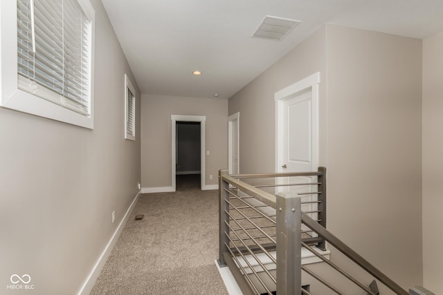 4077 Rookwood Ave, Indianapolis, IN 46208 - hall featuring recessed lighting, an upstairs landing, visible vents, baseboards, and light colored carpet