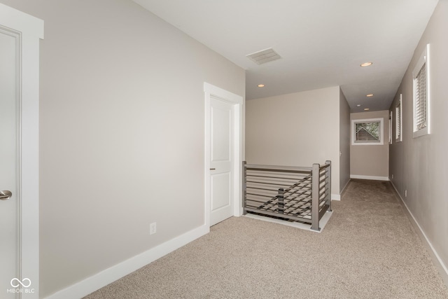 4077 Rookwood Ave, Indianapolis, IN 46208 - corridor with recessed lighting, carpet flooring, an upstairs landing, visible vents, and baseboards