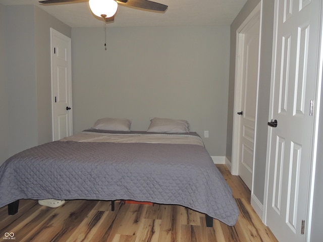 282 W Santee Dr, Greensburg, IN 47240 - bedroom featuring light wood-type flooring, baseboards, and a ceiling fan
