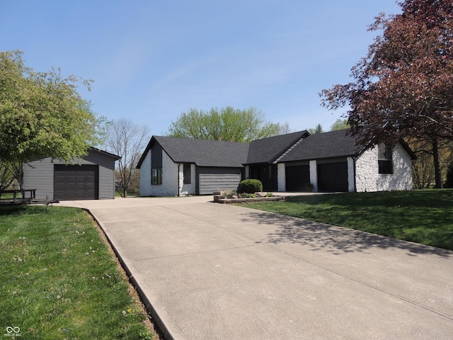 282 W Santee Dr, Greensburg, IN 47240 - ranch-style home featuring a front lawn and an outbuilding