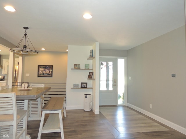 282 W Santee Dr, Greensburg, IN 47240 - kitchen with a chandelier, wood finished floors, baseboards, recessed lighting, and freestanding refrigerator