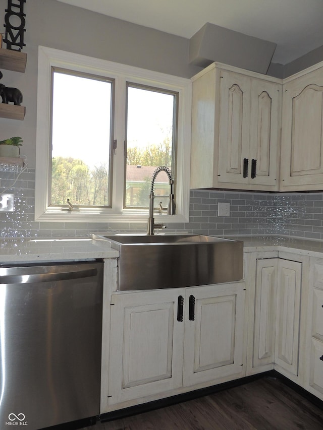282 W Santee Dr, Greensburg, IN 47240 - kitchen featuring stainless steel dishwasher, a sink, tasteful backsplash, and light countertops
