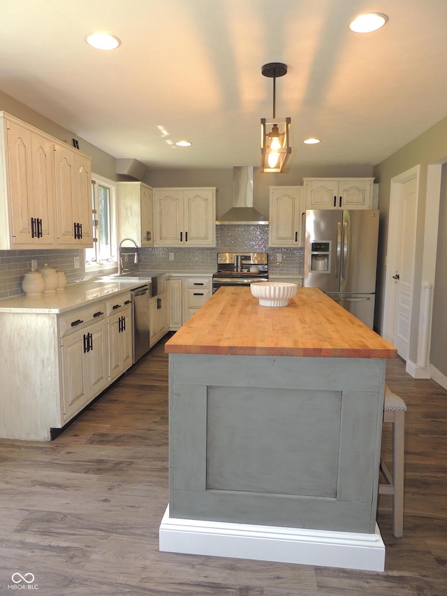 282 W Santee Dr, Greensburg, IN 47240 - kitchen featuring stainless steel appliances, wall chimney exhaust hood, butcher block counters, a sink, and a kitchen island