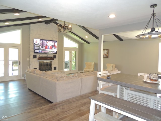 282 W Santee Dr, Greensburg, IN 47240 - living area with a chandelier, wood finished floors, a fireplace, and recessed lighting