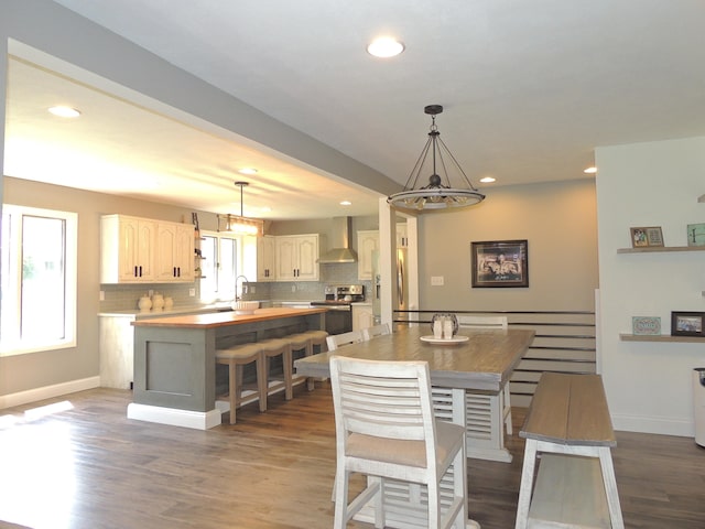 282 W Santee Dr, Greensburg, IN 47240 - dining area with recessed lighting, a chandelier, baseboards, and wood finished floors