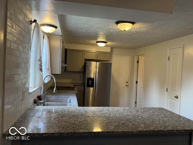 7833 Broadview Dr, Indianapolis, IN 46227 - kitchen featuring stainless steel fridge, a textured ceiling, gray cabinets, and a sink