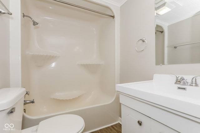 9535 E Michigan St, Indianapolis, IN 46229 - full bath with vanity, toilet, visible vents, wood finished floors, and  shower combination