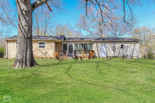 9535 E Michigan St, Indianapolis, IN 46229 - rear view of property featuring a yard, crawl space, and a wooden deck