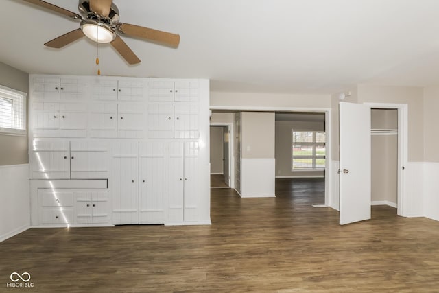 9535 E Michigan St, Indianapolis, IN 46229 - interior space with ceiling fan, wood finished floors, and baseboards