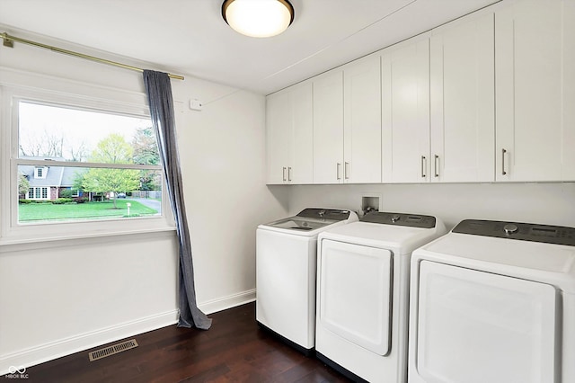11626 Forest Dr, Carmel, IN 46033 - laundry room featuring cabinet space, washer and clothes dryer, baseboards, and dark wood-style floors