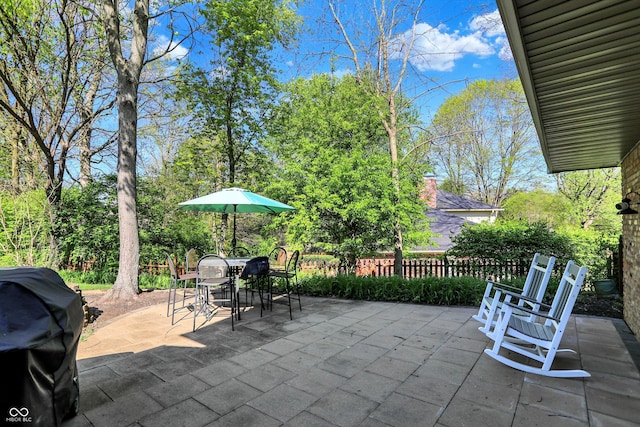 11626 Forest Dr, Carmel, IN 46033 - view of patio / terrace featuring fence, outdoor dining space, and a grill