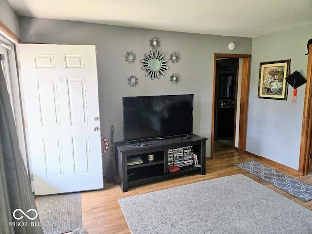 8230 E 11th St, Indianapolis, IN 46219 - living room with wood finished floors and baseboards