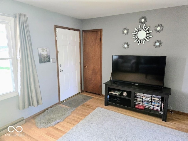 8230 E 11th St, Indianapolis, IN 46219 - living room with wood finished floors