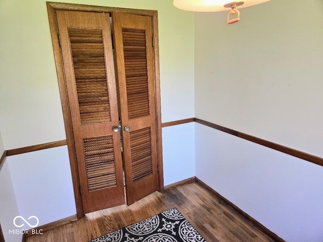 8230 E 11th St, Indianapolis, IN 46219 - interior space with baseboards and dark wood-style floors