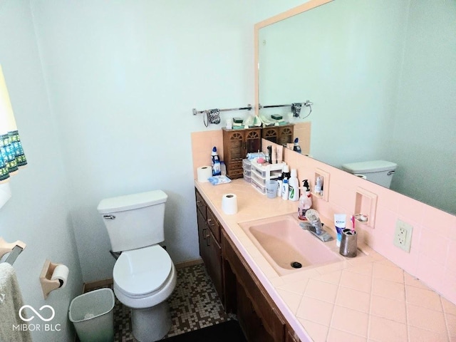 8230 E 11th St, Indianapolis, IN 46219 - bathroom with vanity and toilet