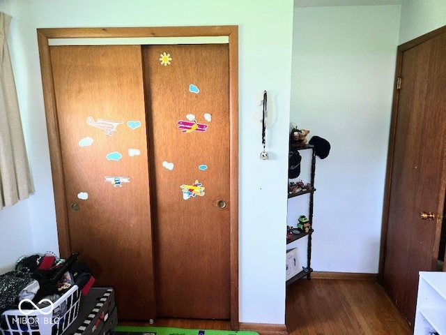 8230 E 11th St, Indianapolis, IN 46219 - interior space featuring wood finished floors and baseboards