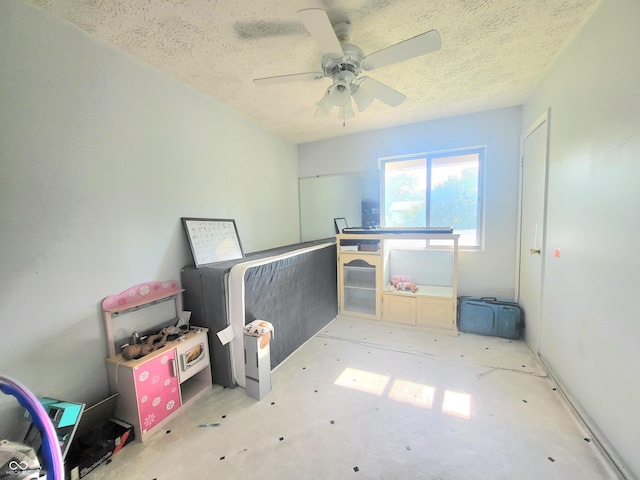 7108 Hearthstone Way, Indianapolis, IN 46227 - spare room with a textured ceiling and a ceiling fan