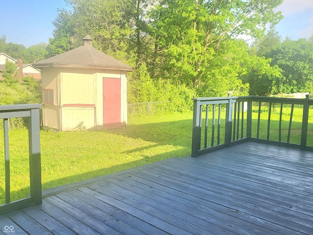 7108 Hearthstone Way, Indianapolis, IN 46227 - wooden terrace featuring a shed, a lawn, and an outdoor structure