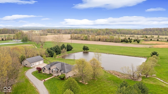 drone / aerial view with a rural view and a water view