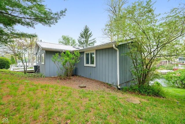 exterior space with metal roof
