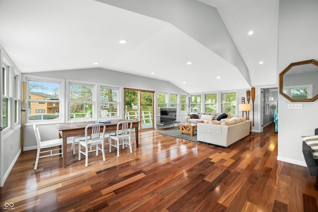 living area with baseboards, recessed lighting, wood finished floors, and lofted ceiling