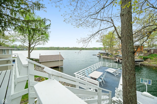 dock area with a water view