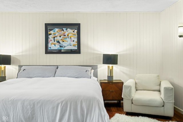 bedroom featuring wood finished floors