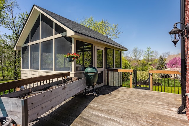deck featuring a sunroom