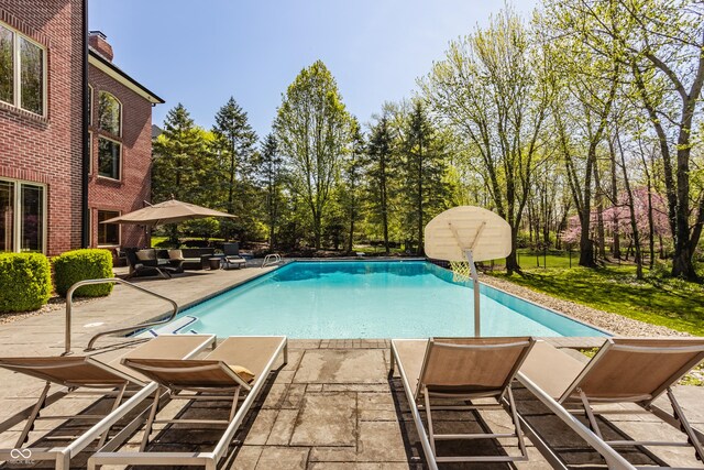 pool featuring a patio area