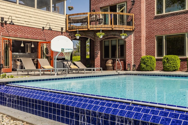 pool featuring a patio area