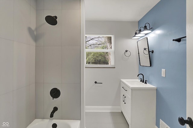 4775 E 56th St, Indianapolis, IN 46220 - full bath featuring shower / bathing tub combination, vanity, tile patterned flooring, and baseboards