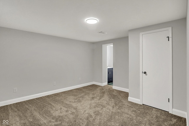 4775 E 56th St, Indianapolis, IN 46220 - carpeted spare room featuring visible vents and baseboards