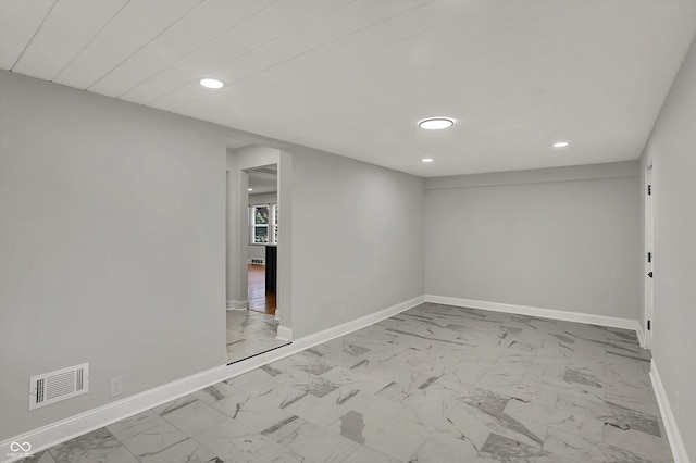 4775 E 56th St, Indianapolis, IN 46220 - basement featuring recessed lighting, marble finish floor, and visible vents