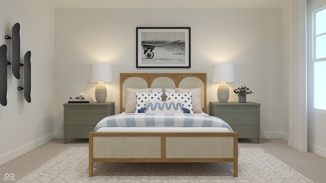bedroom with carpet and baseboards