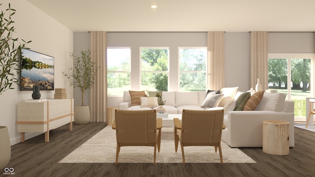 living area with plenty of natural light, wood finished floors, and recessed lighting