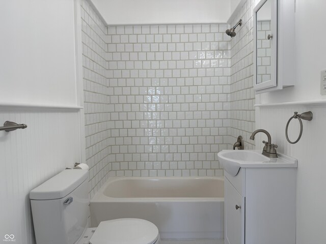 1378 Hannibal St, Noblesville, IN 46060 - full bath featuring toilet, vanity, a wainscoted wall, and shower / washtub combination