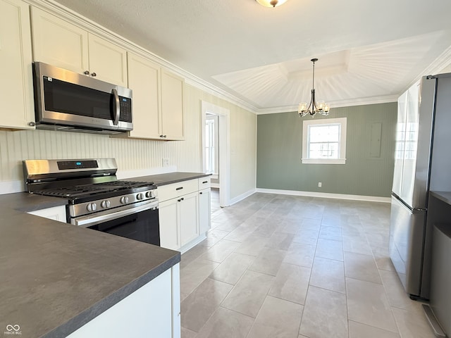 1378 Hannibal St, Noblesville, IN 46060 - kitchen with stainless steel appliances, ornamental molding, a chandelier, and dark countertops