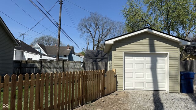 1378 Hannibal St, Noblesville, IN 46060 - detached garage featuring fence and gravel driveway