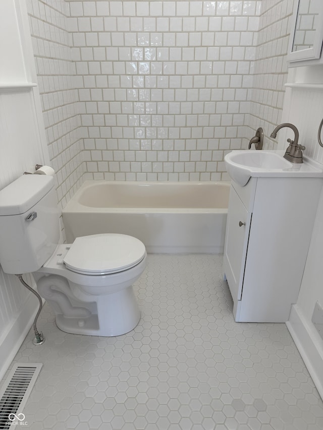 1378 Hannibal St, Noblesville, IN 46060 - full bath with vanity, tile patterned floors, toilet, visible vents, and tub / shower combination