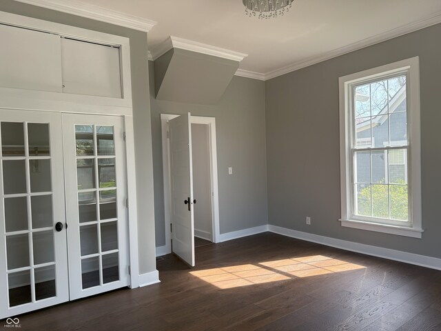 1378 Hannibal St, Noblesville, IN 46060 - spare room featuring a wealth of natural light, ornamental molding, dark wood-style flooring, and baseboards
