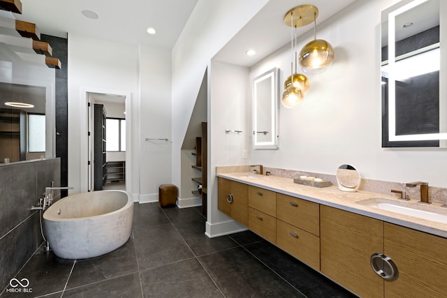 1333 Chatham Rdg Ct, Westfield, IN 46074 - bathroom featuring double vanity, a sink, tile patterned flooring, and a soaking tub