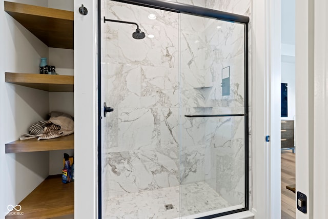 1333 Chatham Rdg Ct, Westfield, IN 46074 - bathroom featuring a marble finish shower and wood finished floors