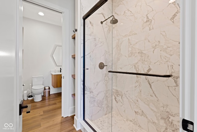 1333 Chatham Rdg Ct, Westfield, IN 46074 - bathroom featuring a marble finish shower, vanity, toilet, and wood finished floors