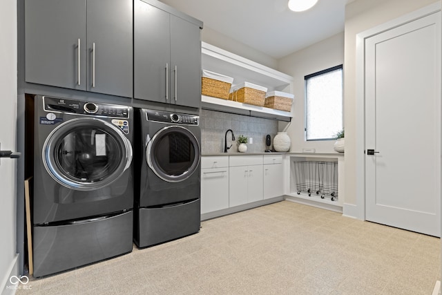 1333 Chatham Rdg Ct, Westfield, IN 46074 - laundry area featuring a sink, light floors, cabinet space, and washer and clothes dryer